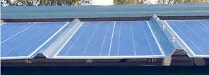 Steel roofing with built-in solar cells