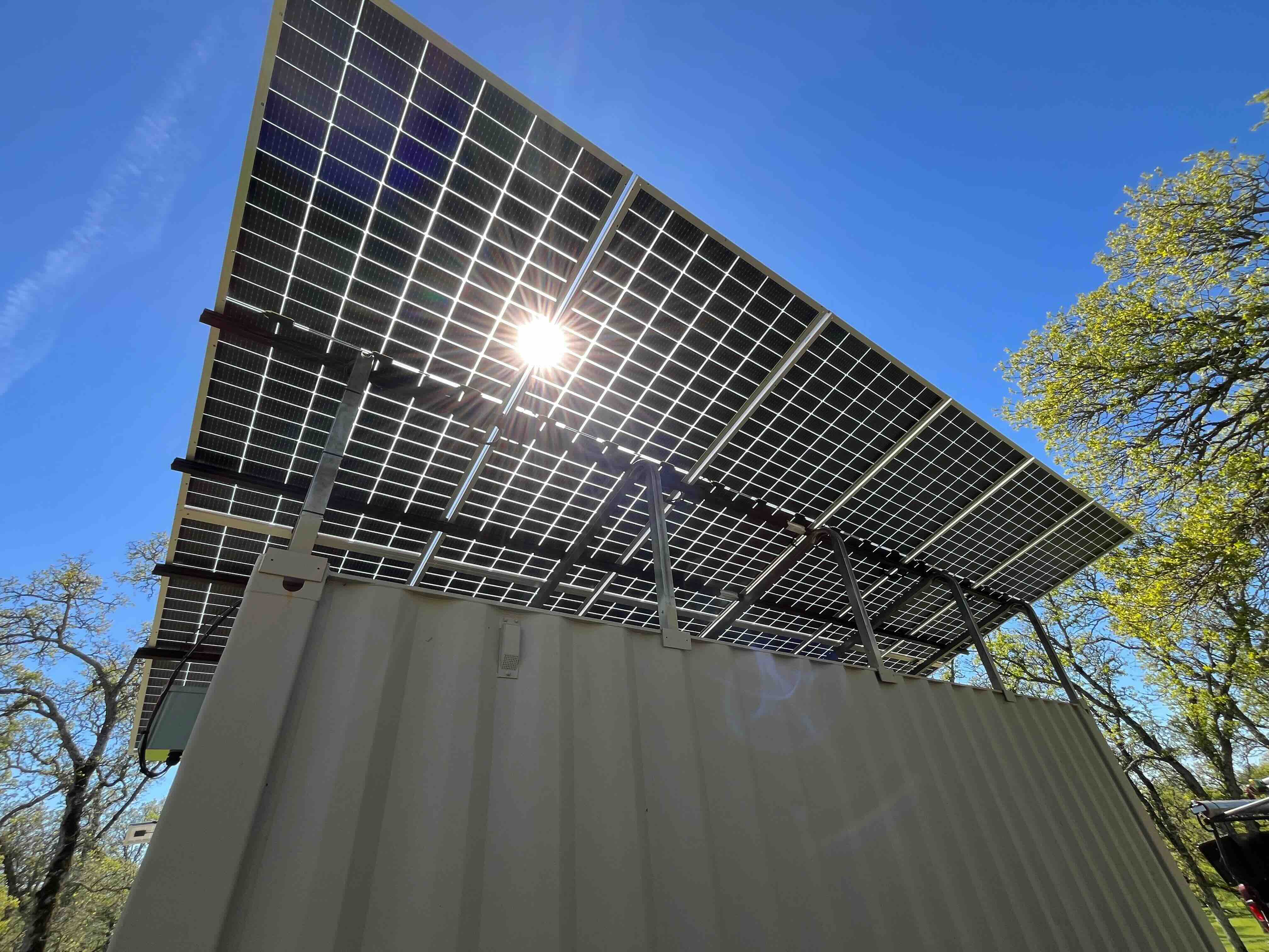shipping container solar with bi-facial panels