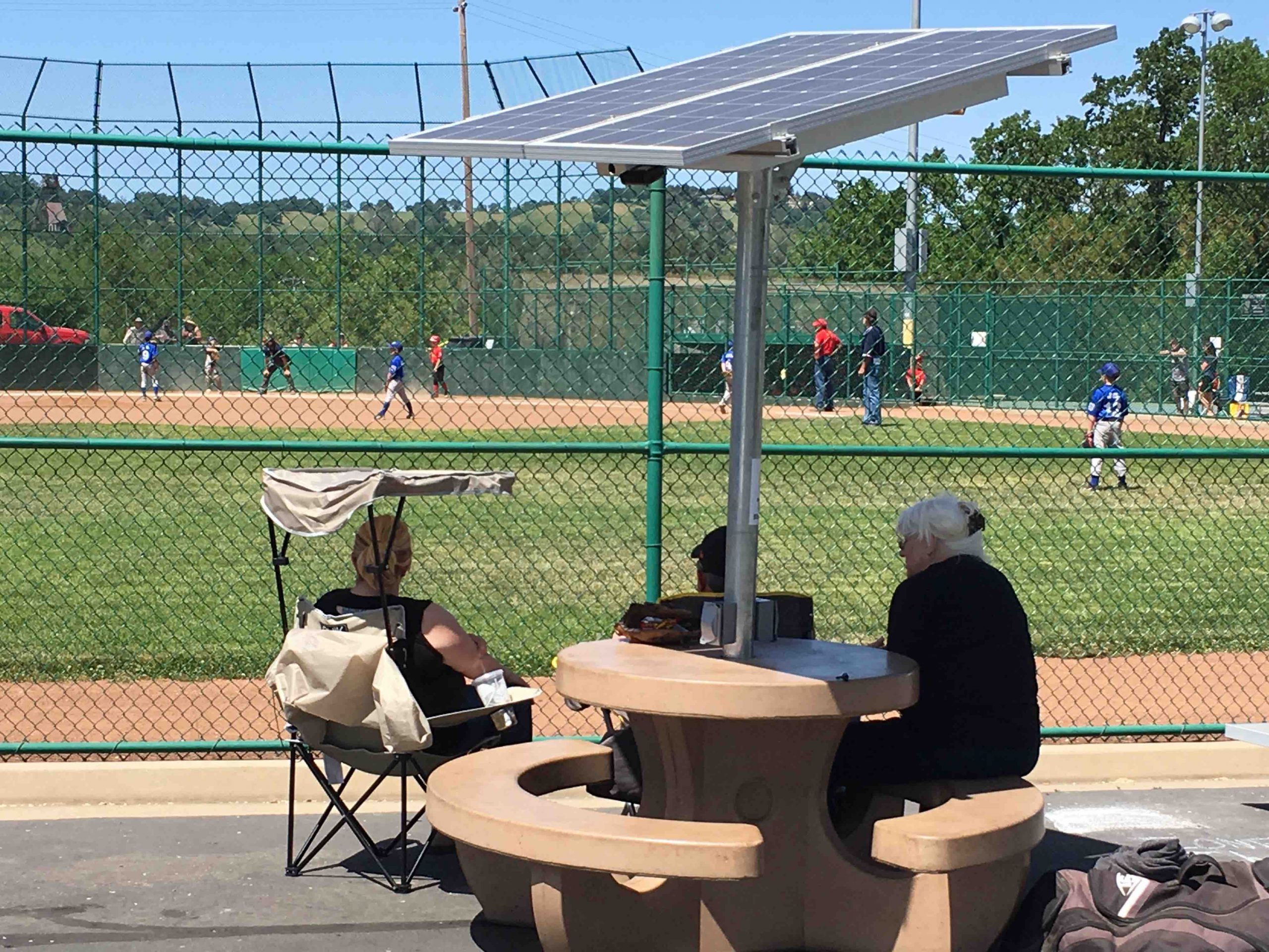Cafe 1 ShadeCharger beside a ballpark