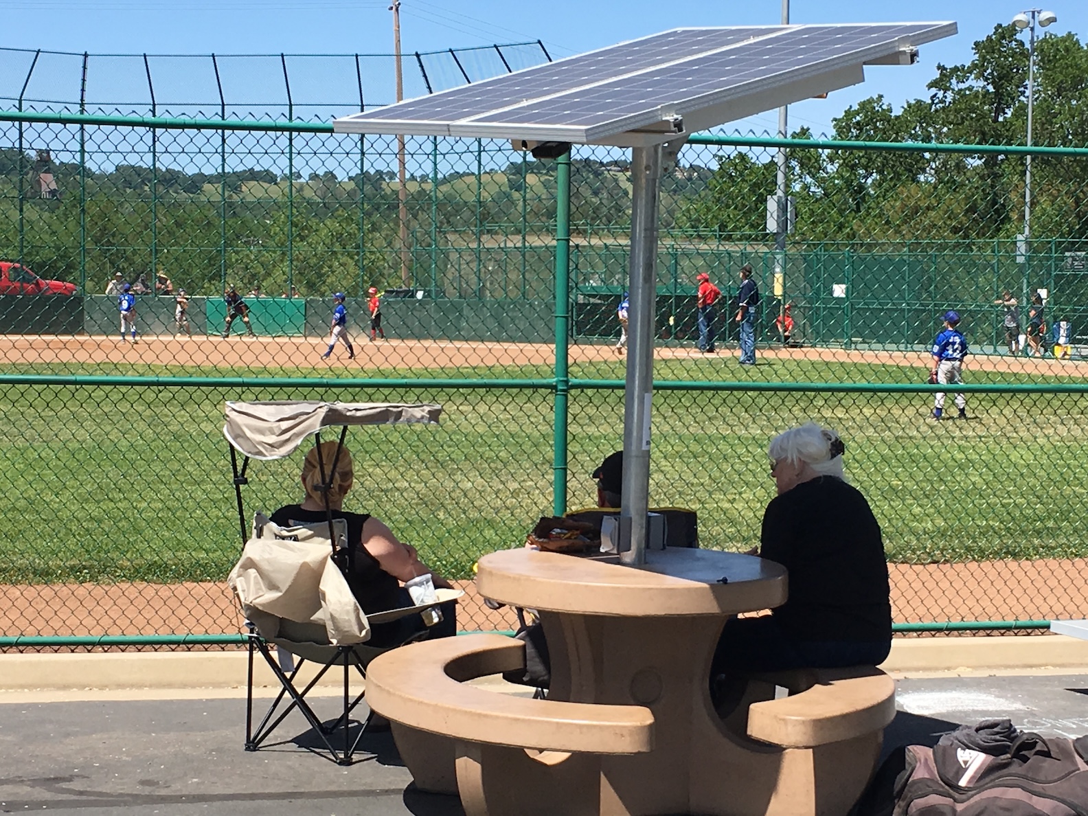 ShadeCharger solar picnic table at baseball game