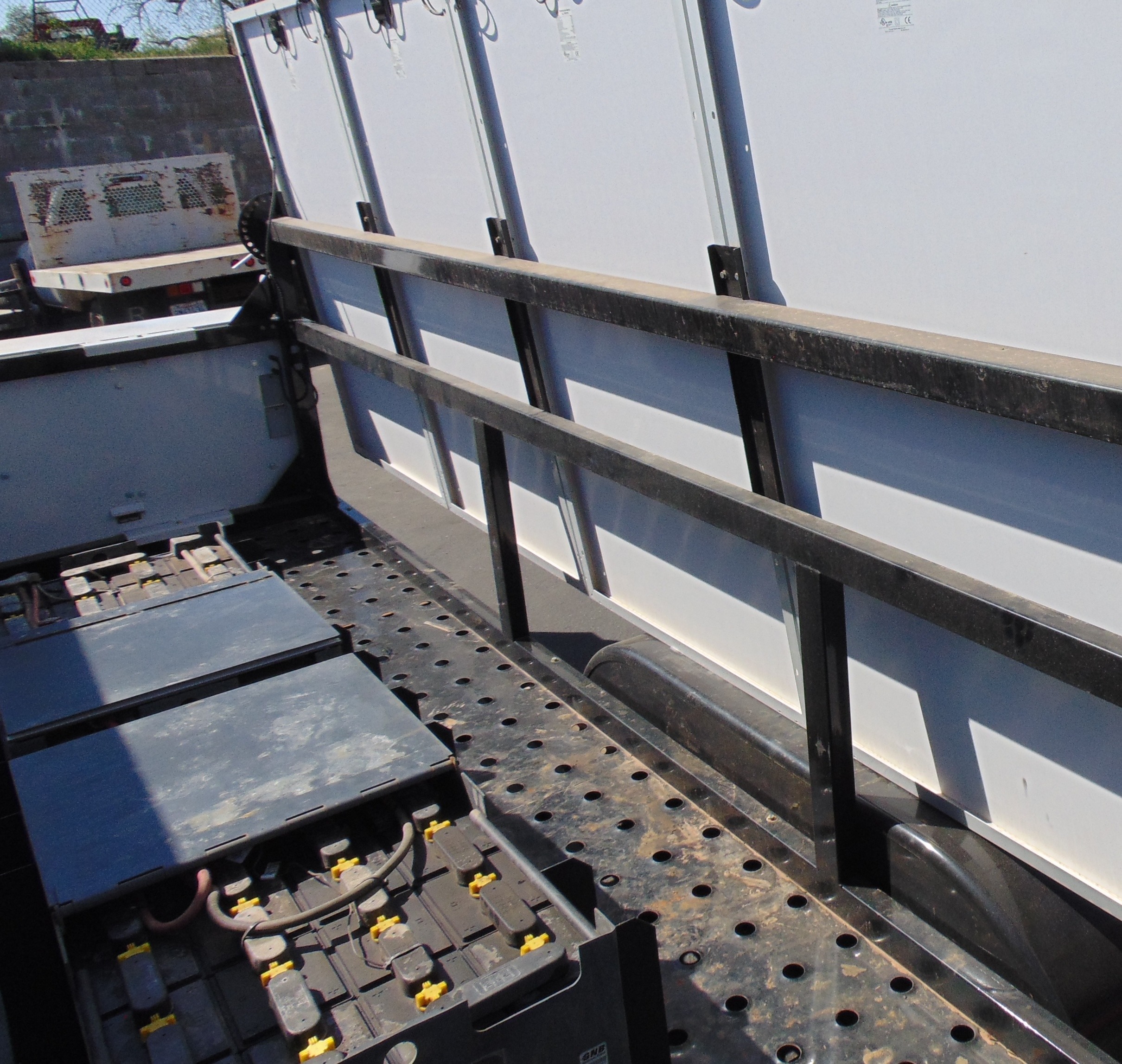 Backside view of solar trailer panels and trailer wiring