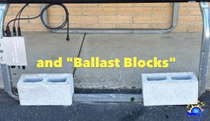 For increased wind resistance, notched cinder blocks as ballast