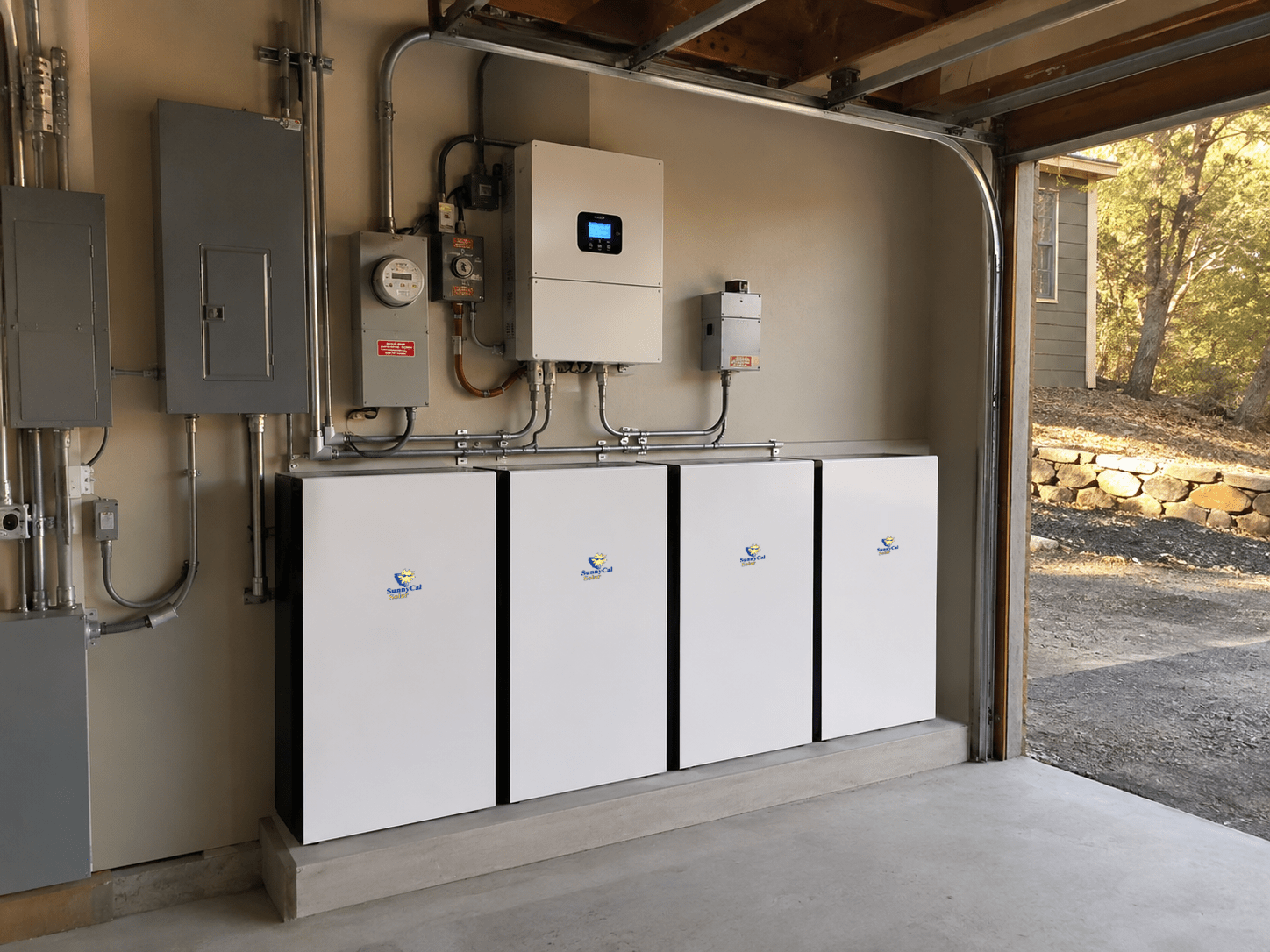 Battery Backup for Existing Solar System Battery backup system installed with solar inverter and electrical panels in a home garage
