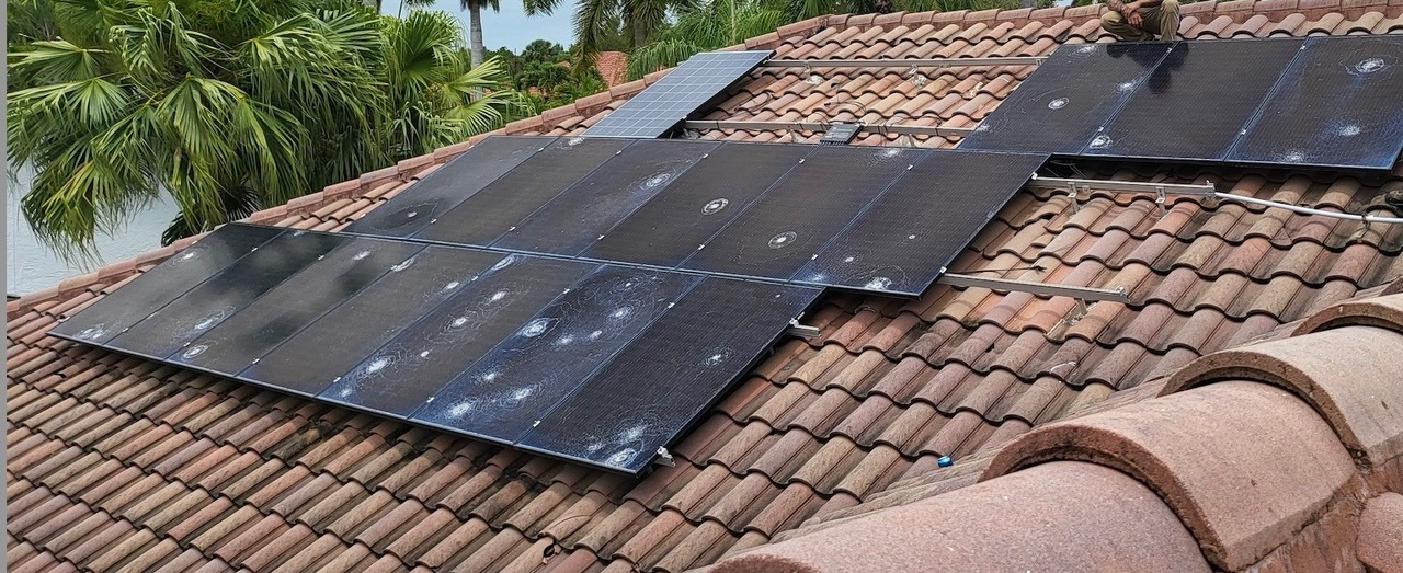 Broken solar panels in Florida before protection was added